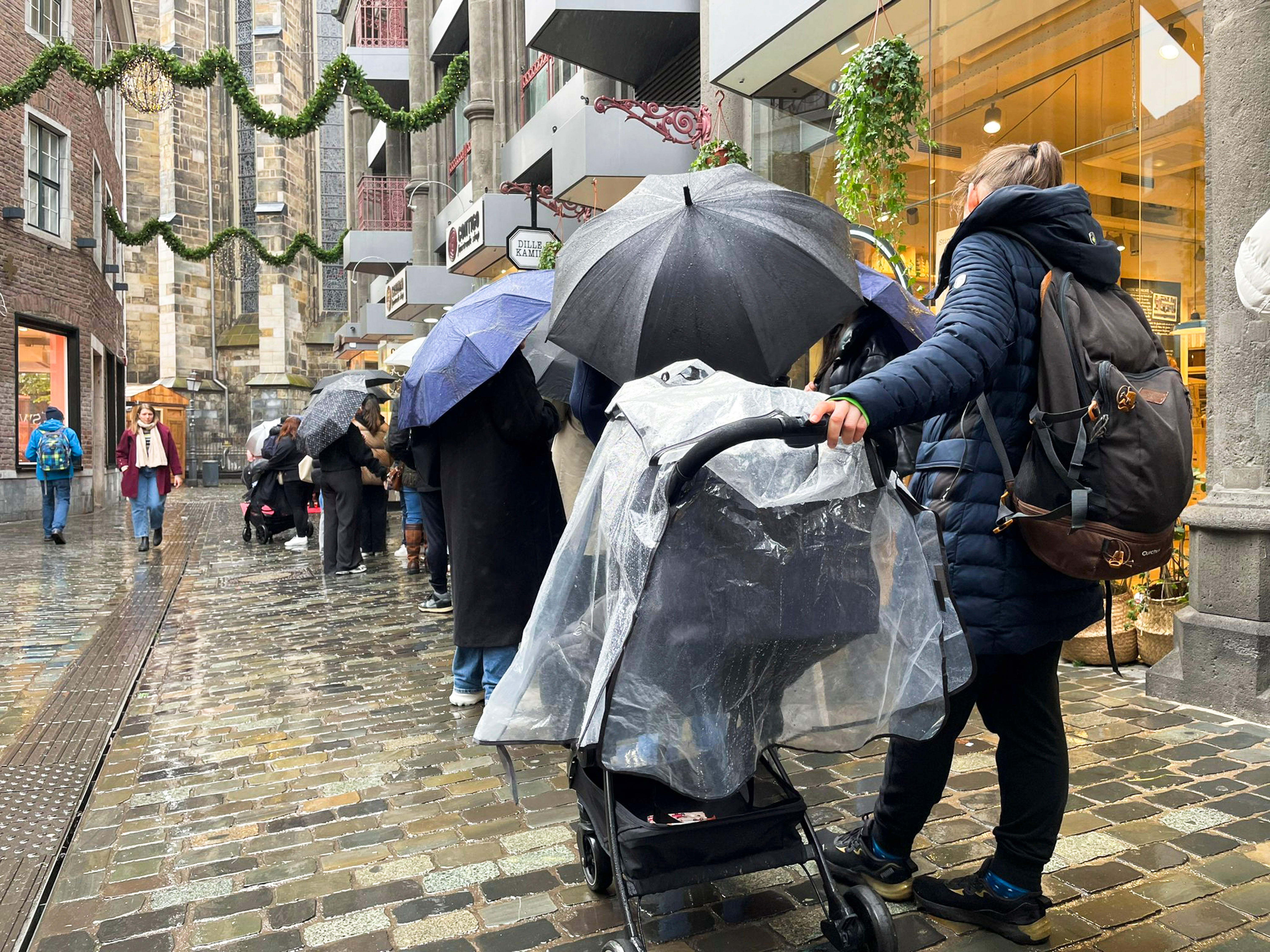 People queue outside of a Lindt chocolate shop to buy limited bars ‘Dubai Chocolate’, in Aachen, Germany